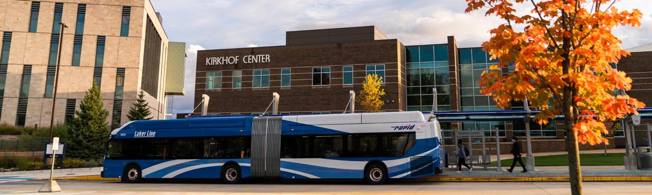 Laker Line bus in front of GVSU Allendale Campus Kirkhof Center in Fall